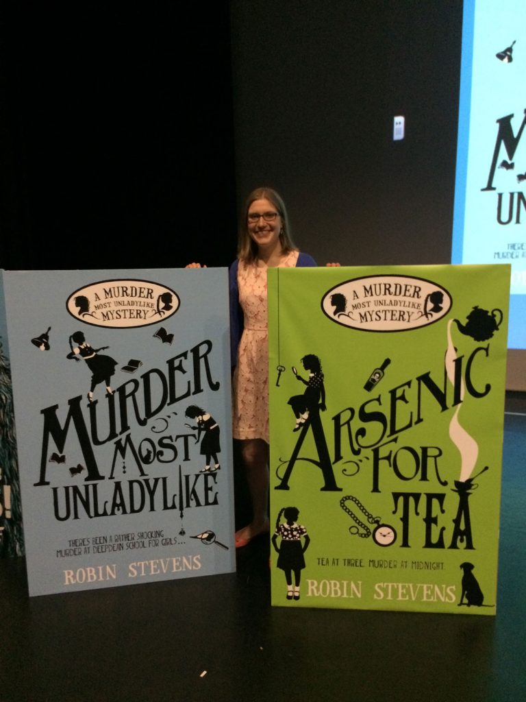 With UNBELIEVABLY giant books!